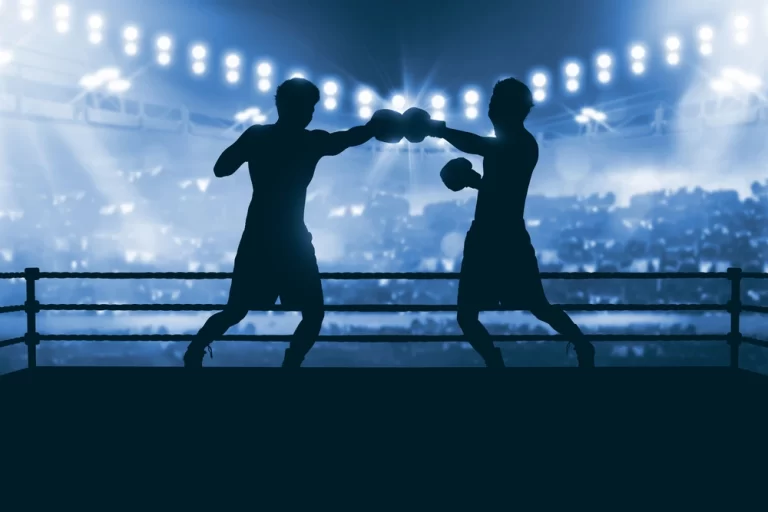 Boxing betting sites - two boxers silhouette